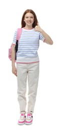 Photo of Teenage girl with backpack showing thumbs up on white background