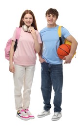 Photo of Teenage girl and boy with basketball on white background