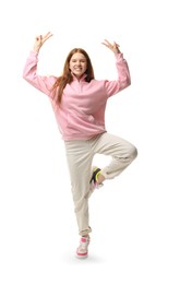 Photo of Happy teenage girl posing on white background