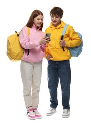 Photo of Teenage girl showing her friend something on smartphone against white background