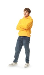 Photo of Happy teenage boy posing on white background