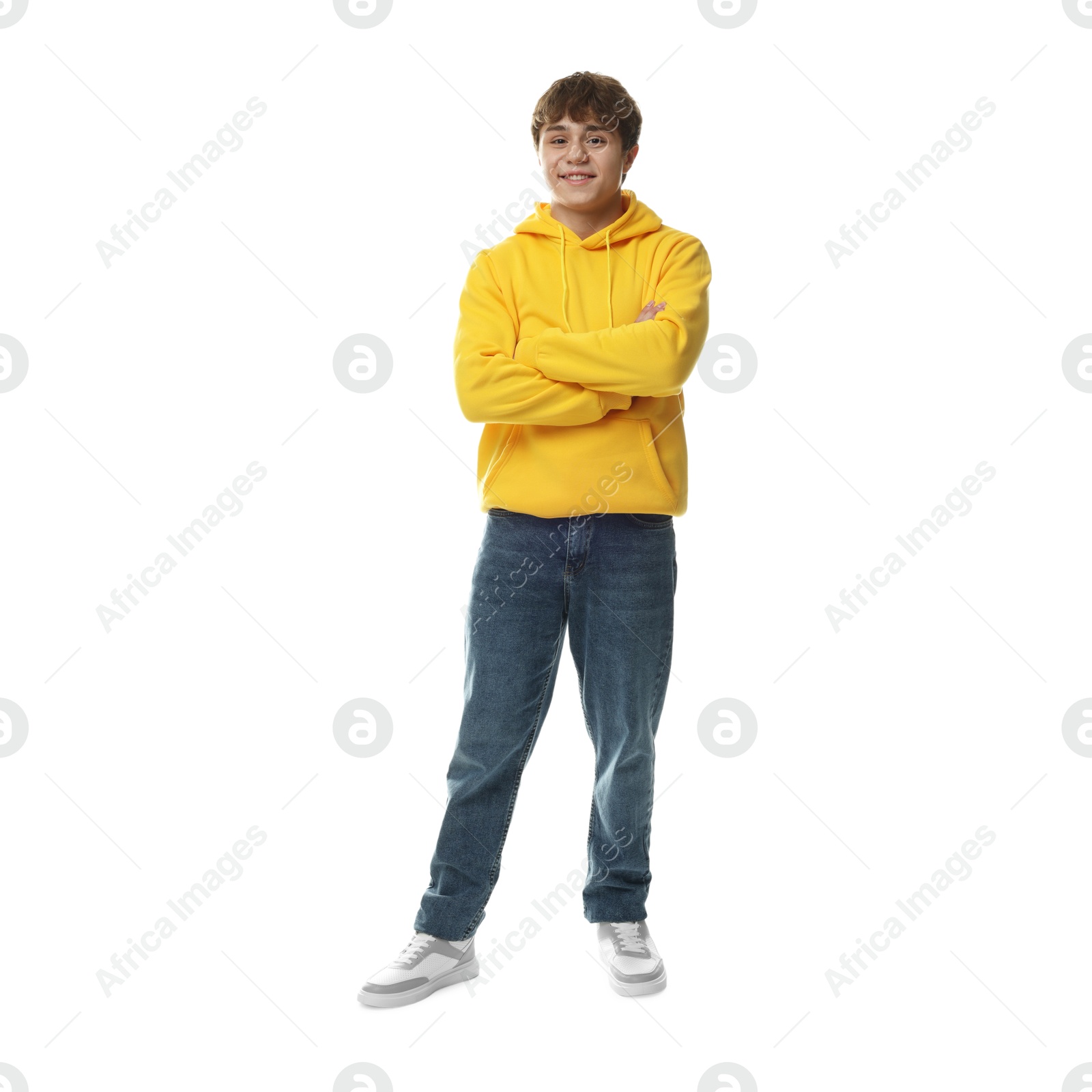 Happy teenage boy posing on white background Photo of Happy teenage boy posing on white background