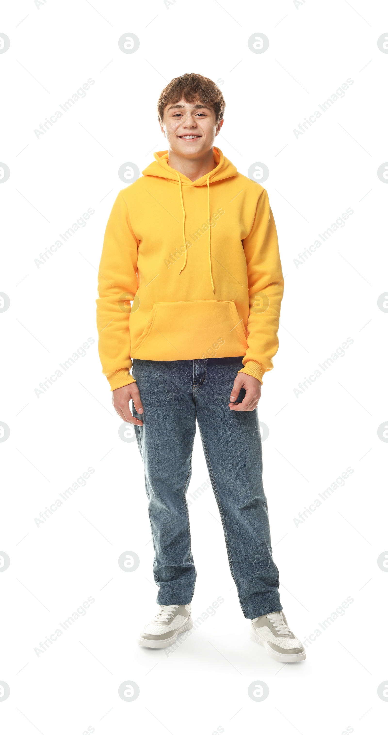 Happy teenage boy posing on white background Photo of Happy teenage boy posing on white background