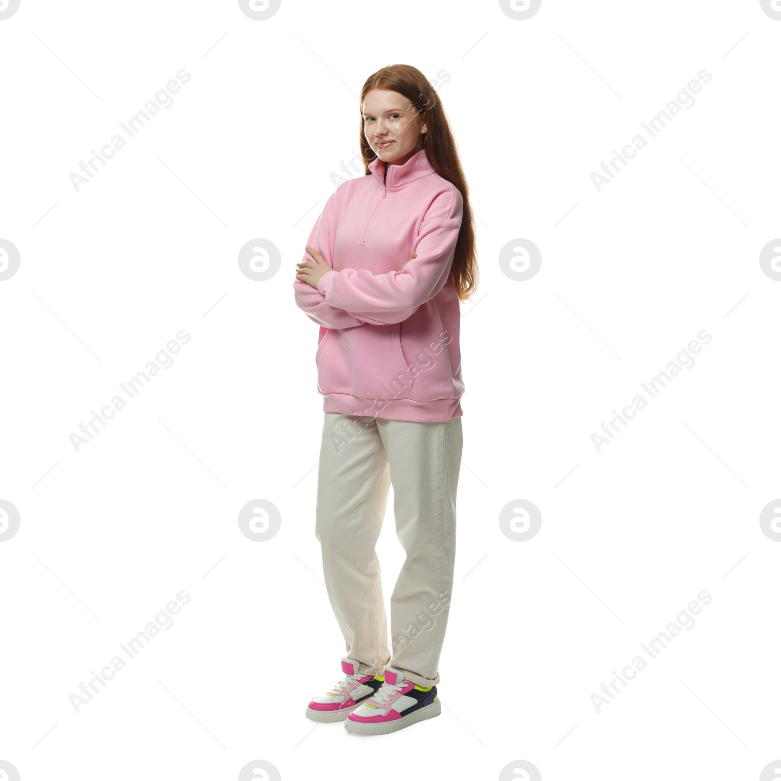 Photo of Happy teenage girl posing on white background