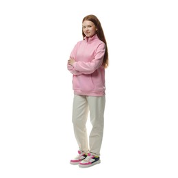 Photo of Happy teenage girl posing on white background