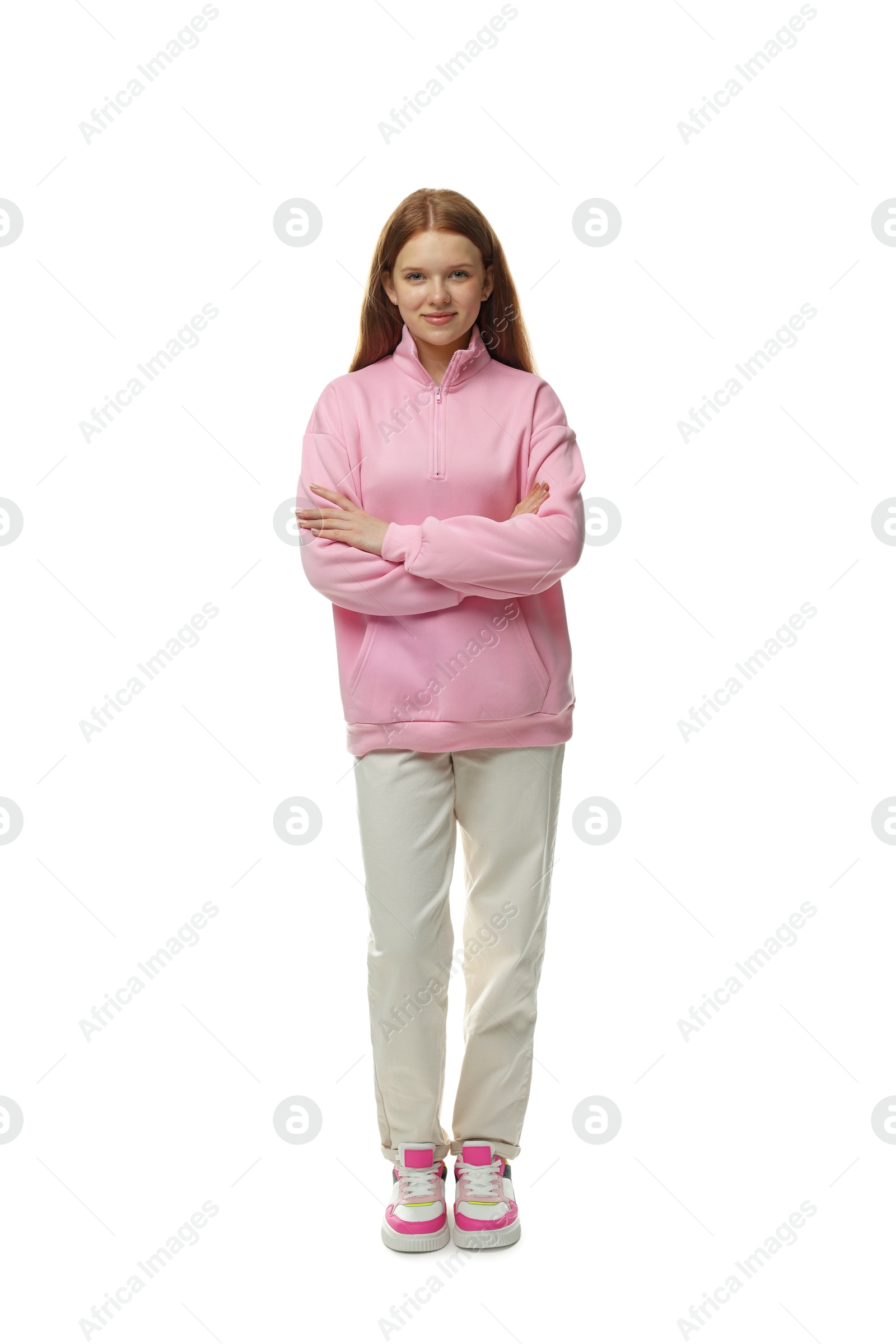 Happy teenage girl posing on white background Photo of Happy teenage girl posing on white background