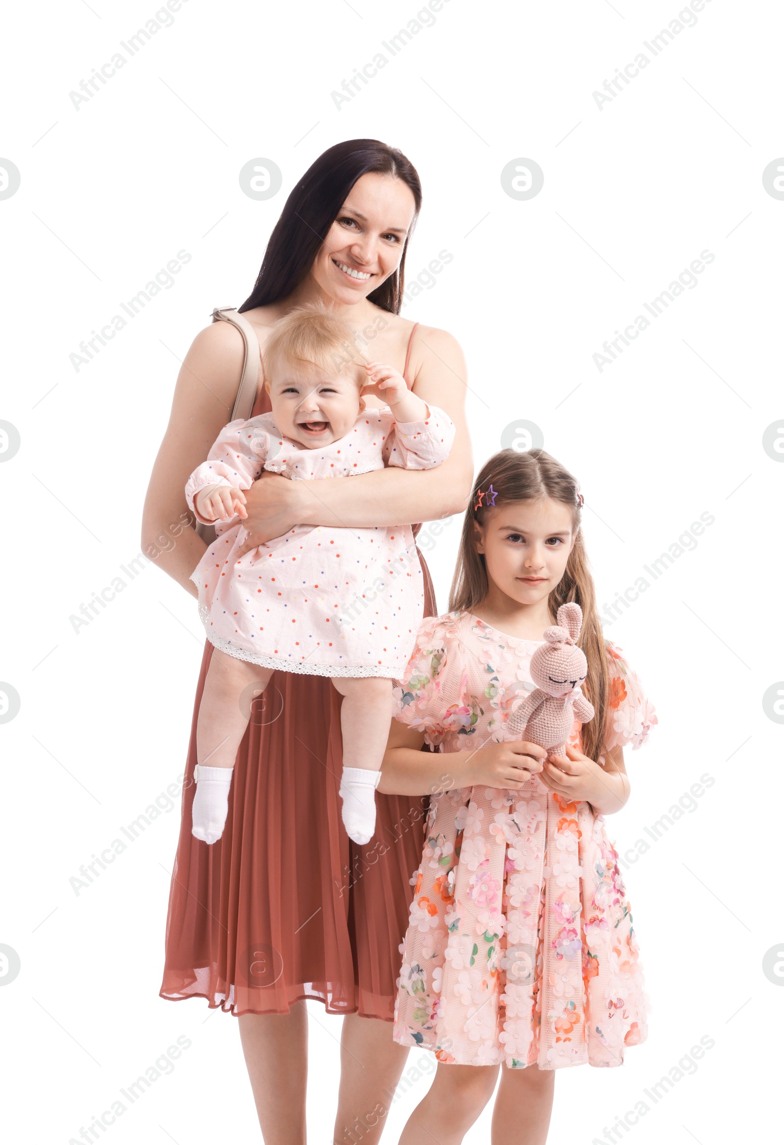 Mother and her cute kids on white background Photo of Mother and her cute kids on white background