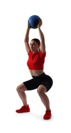 Photo of Athletic woman exercising with medicine ball on white background