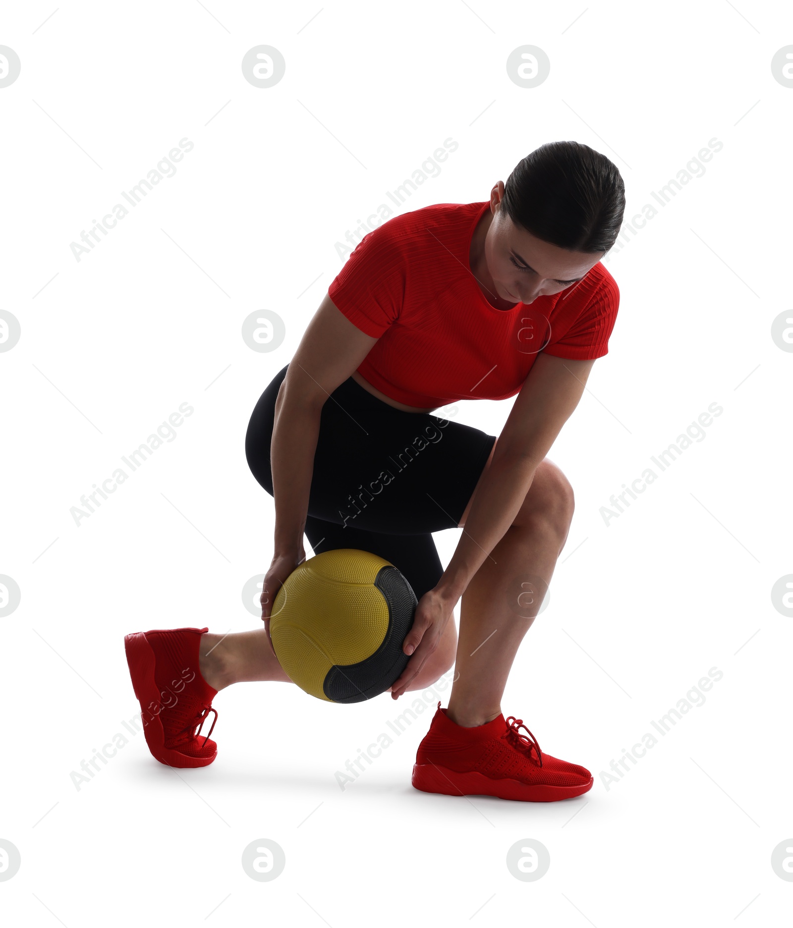 Athletic woman exercising with medicine ball on white background Photo of Athletic woman exercising with medicine ball on white background