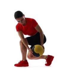 Photo of Athletic woman exercising with medicine ball on white background