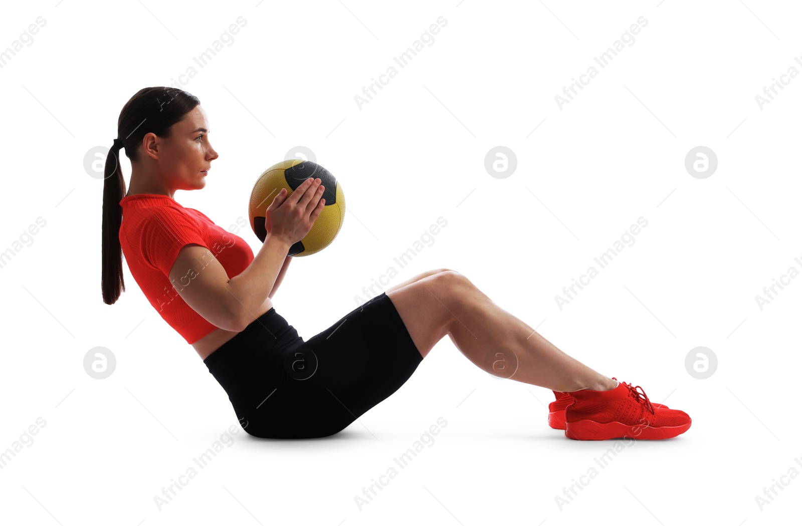 Athletic woman exercising with medicine ball on white background Photo of Athletic woman exercising with medicine ball on white background