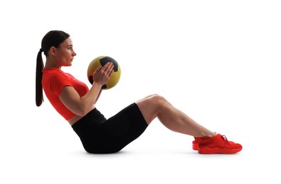 Photo of Athletic woman exercising with medicine ball on white background