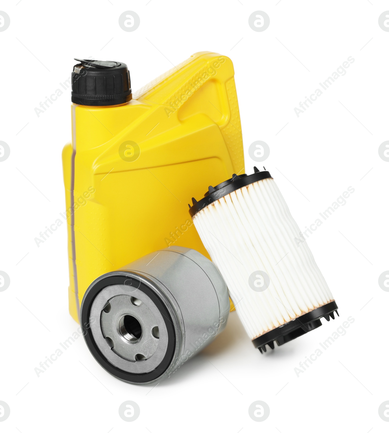 Photo of Motor oil in yellow canister and filters isolated on white