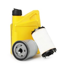 Photo of Motor oil in yellow canister and filters isolated on white