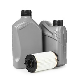 Photo of Motor oil in plastic canisters and filter isolated on white