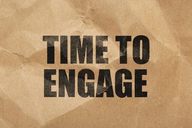 Image of Time To Engage words on crumpled sheet of paper