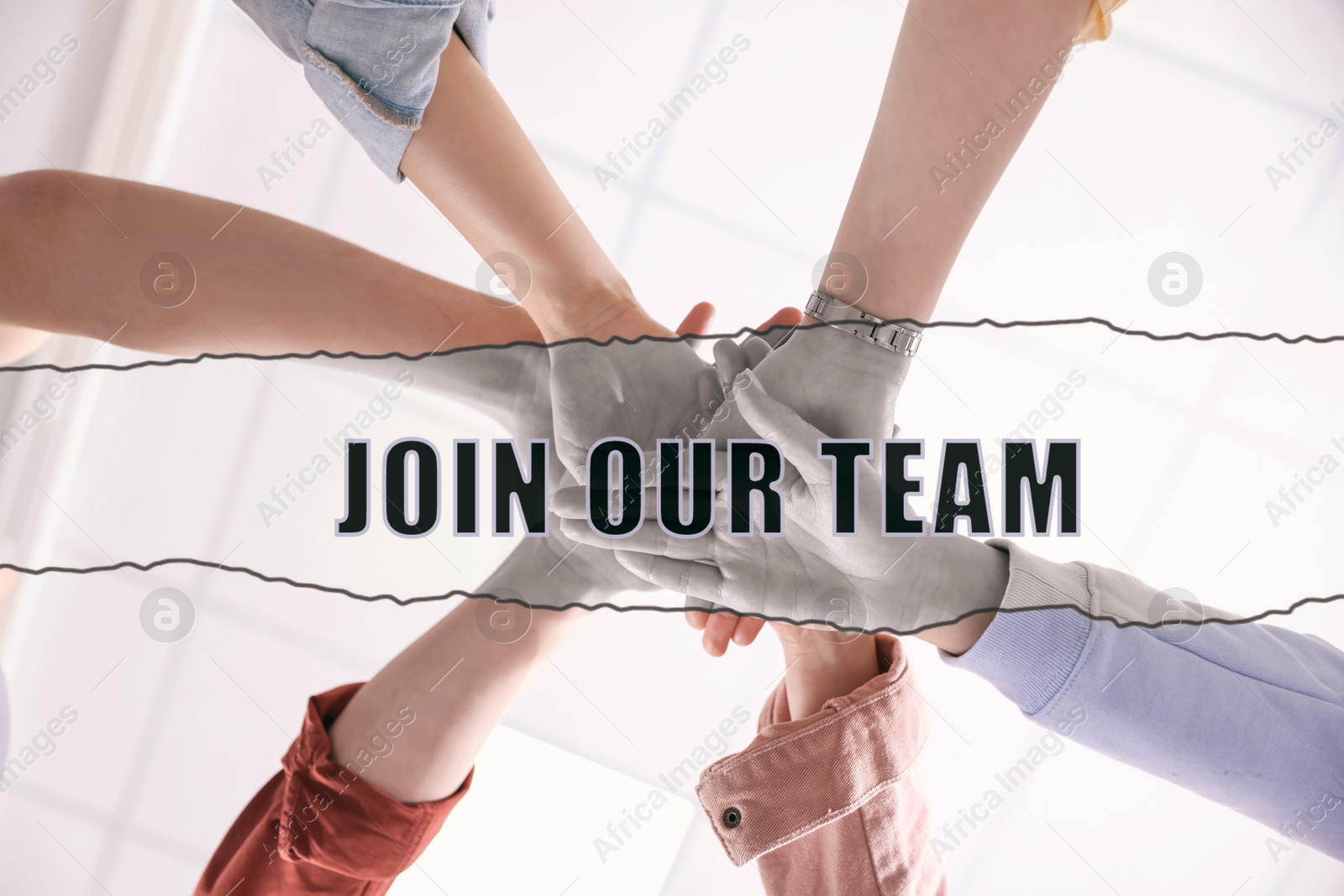 Join Our Team. Group of people holding hands together indoors, bottom view. Employee search, recruitment concept Image of Join Our Team. Group of people holding hands together indoors, bottom view. Employee search, recruitment concept