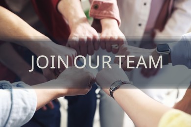 Image of Join Our Team. Group of people holding fists together indoors, closeup. Employee search, recruitment concept