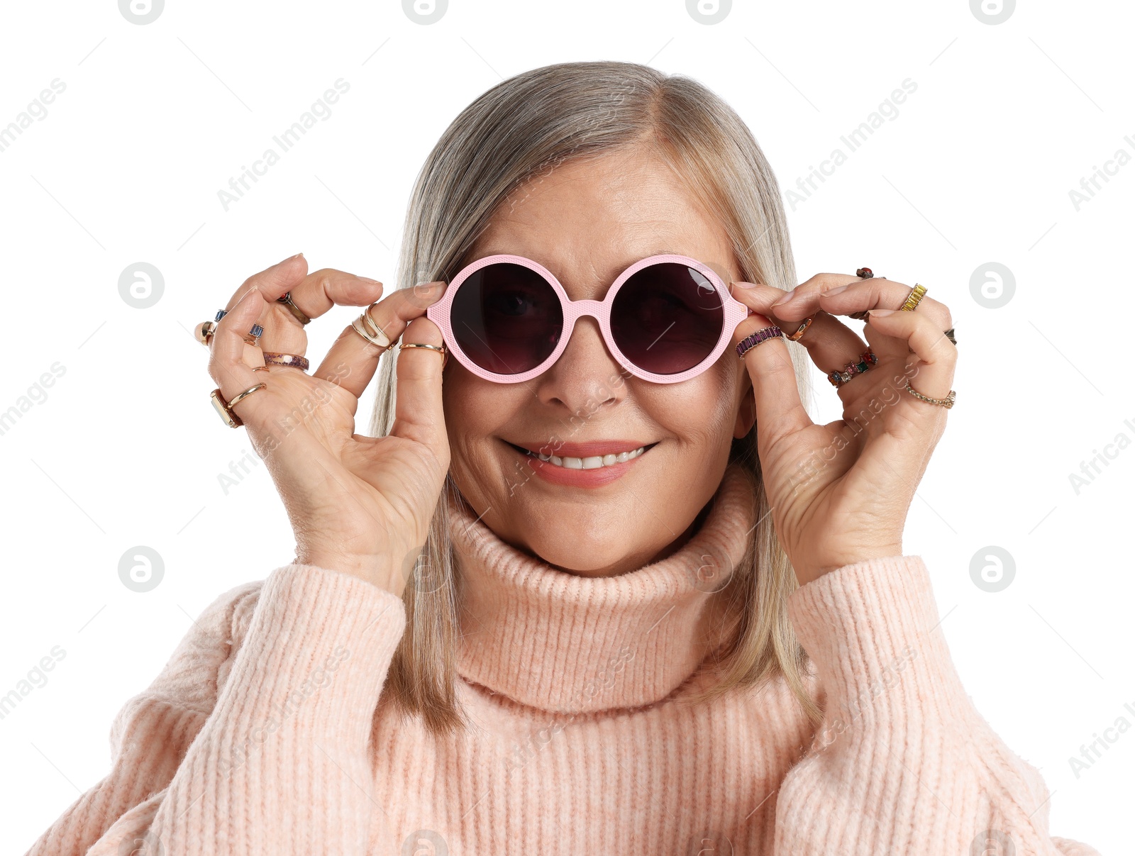 Senior woman wearing different rings and sunglasses on white background Photo of Senior woman wearing different rings and sunglasses on white background
