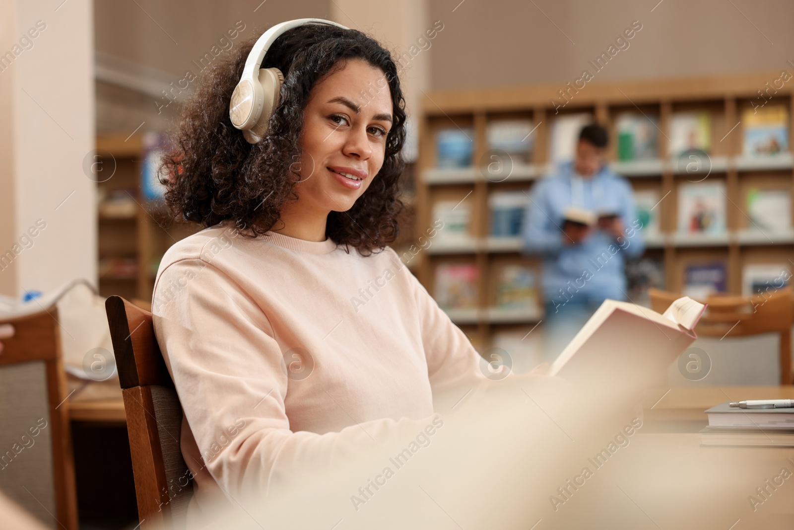 People studying in public library, selective focus Photo of People studying in public library, selective focus