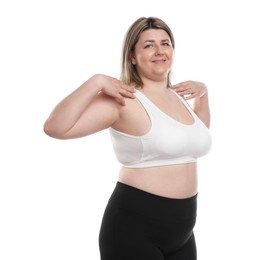 Photo of Weight loss. Plus size woman on white background