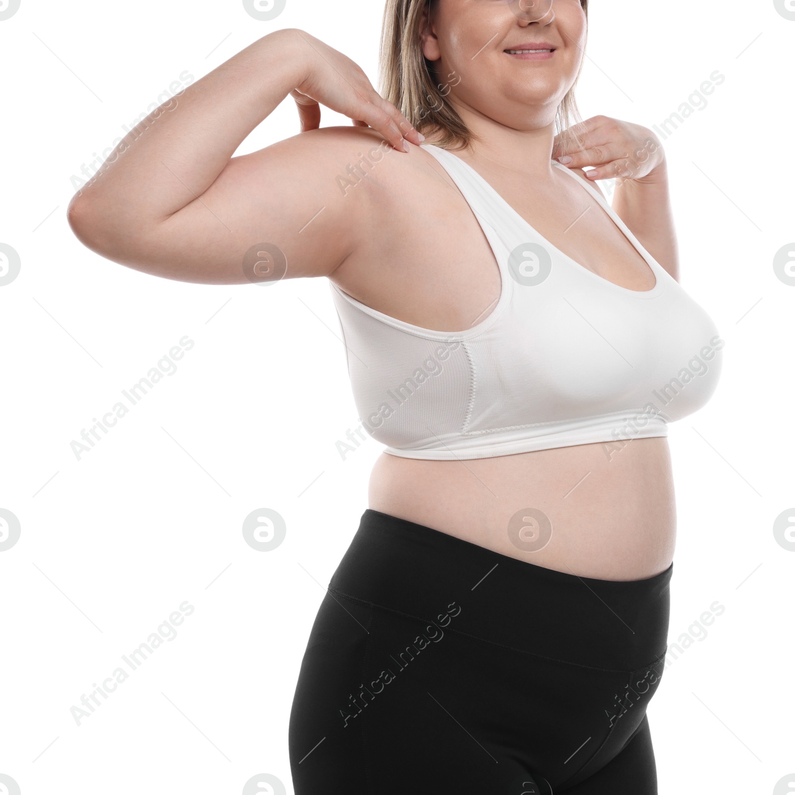 Weight loss. Plus size woman on white background, closeup Photo of Weight loss. Plus size woman on white background, closeup