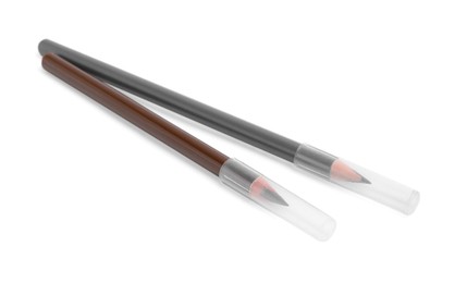 Photo of Two different eyebrow pencils isolated on white