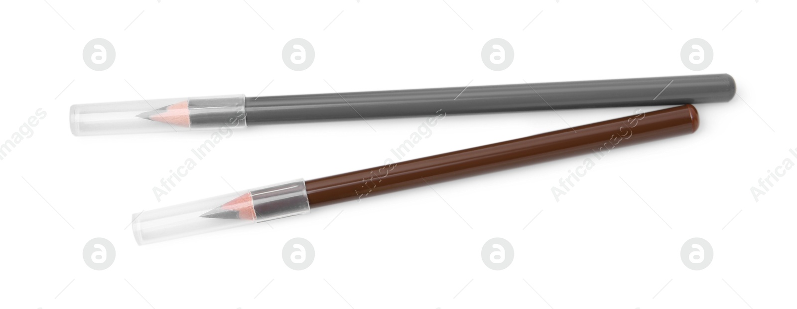Photo of Different eyebrow pencils isolated on white, top view