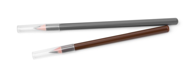 Photo of Different eyebrow pencils isolated on white, top view
