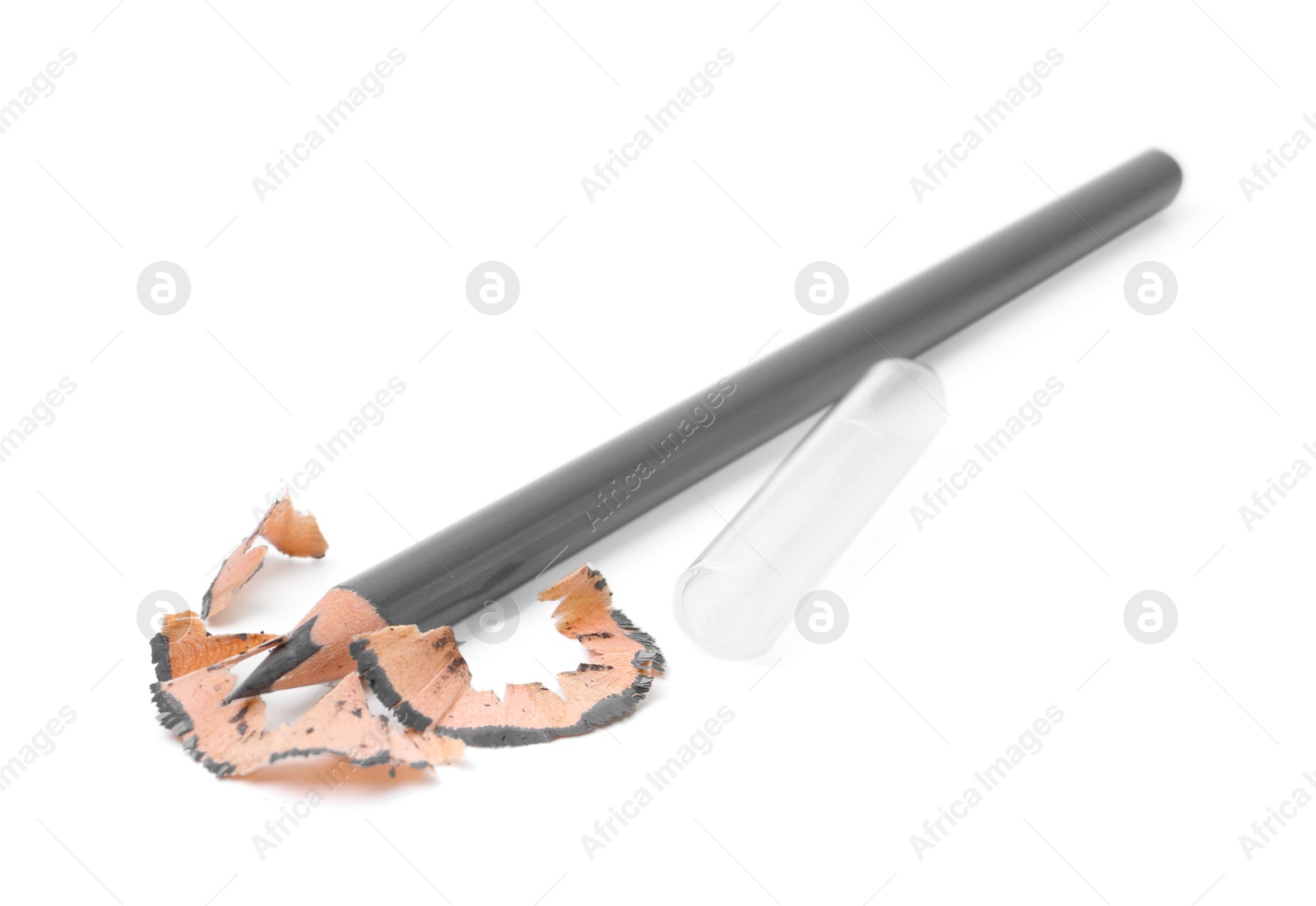 Beautiful eyebrow pencil and shavings isolated on white Photo of Beautiful eyebrow pencil and shavings isolated on white