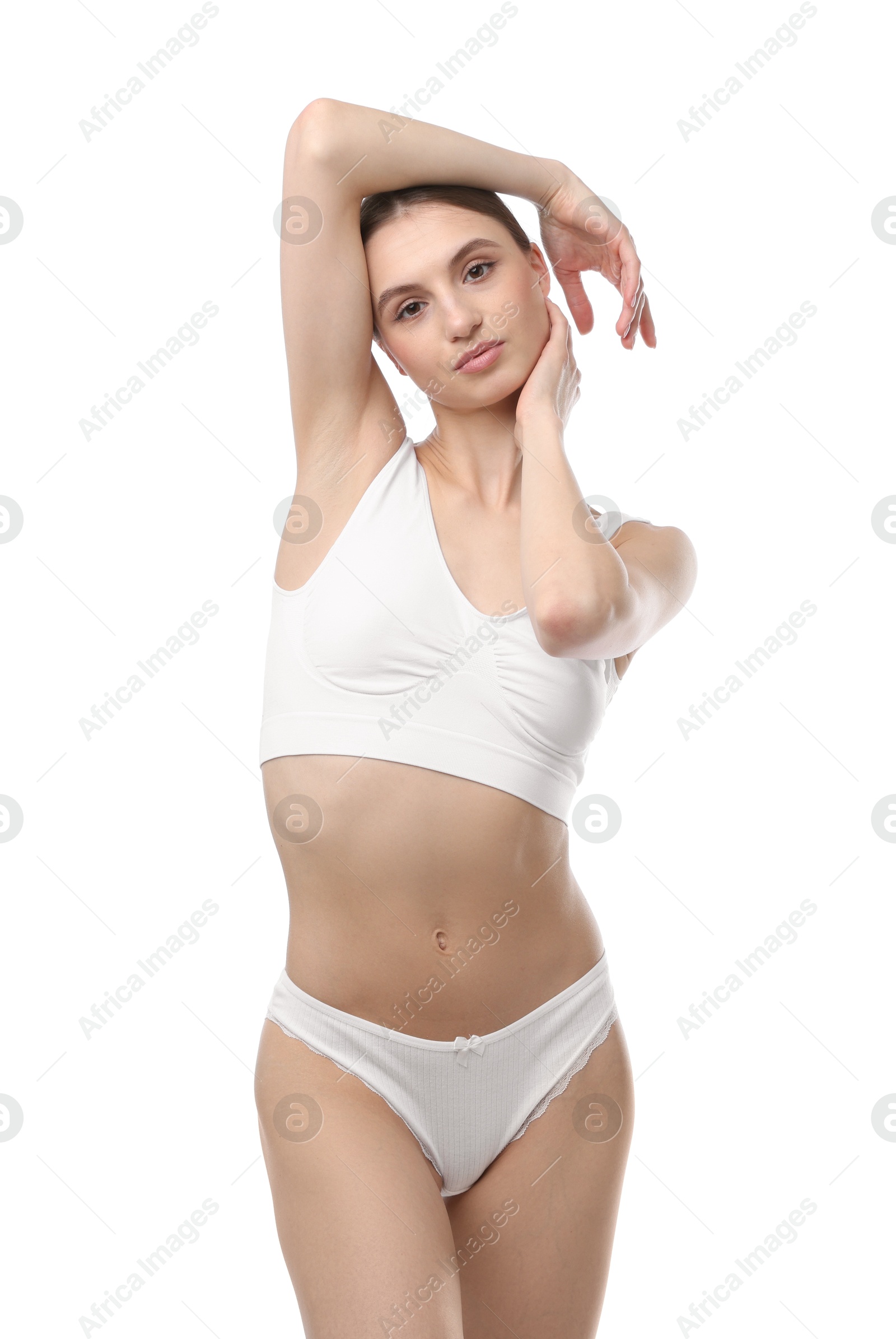 Woman wearing beautiful underwear on white background Photo of Woman wearing beautiful underwear on white background