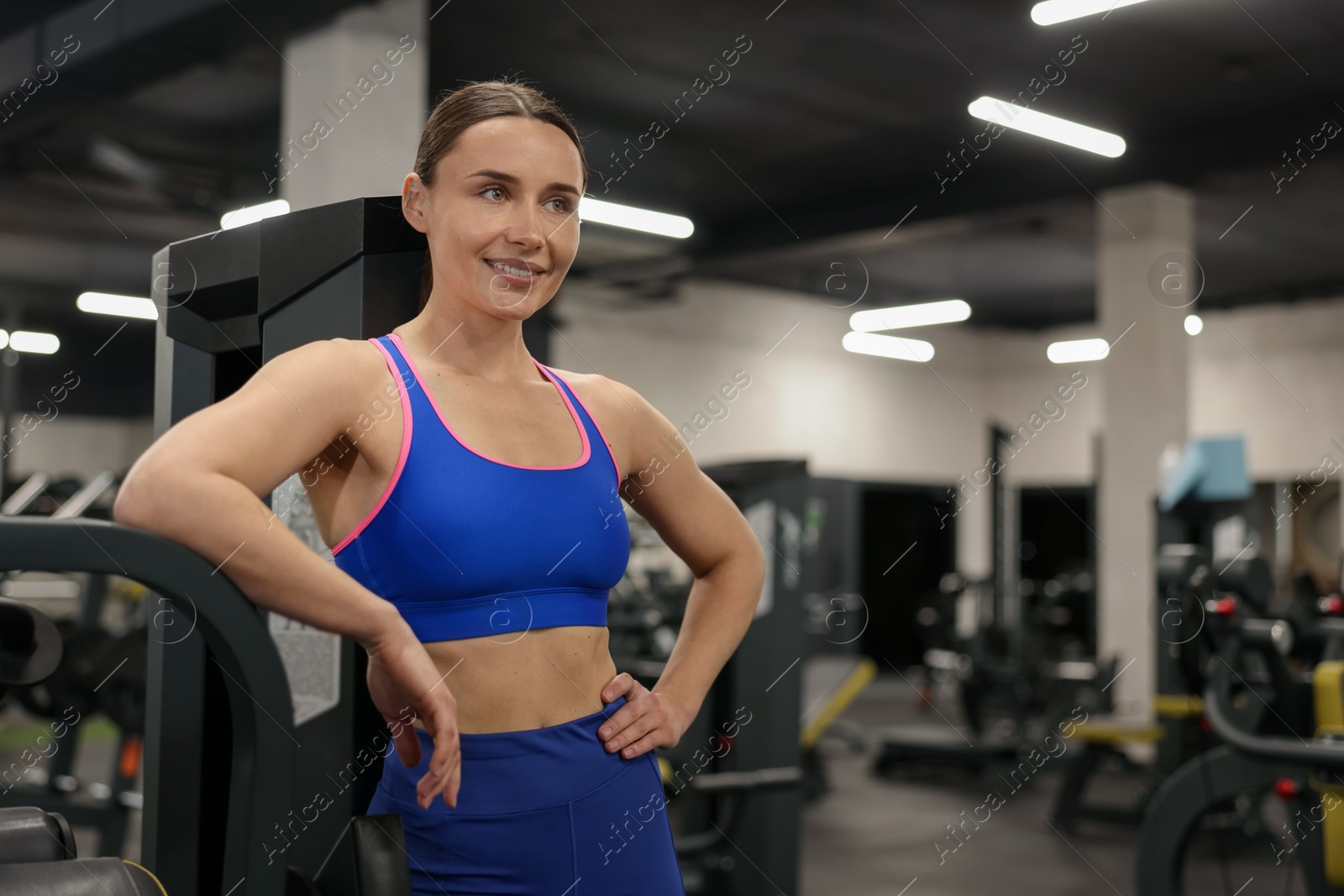 Portrait of professional personal trainer in gym. Space for text Photo of Portrait of professional personal trainer in gym. Space for text