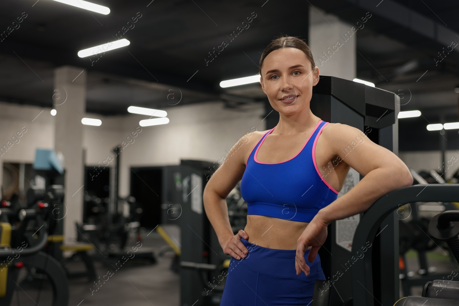 Portrait of professional personal trainer in gym. Space for text Photo of Portrait of professional personal trainer in gym. Space for text