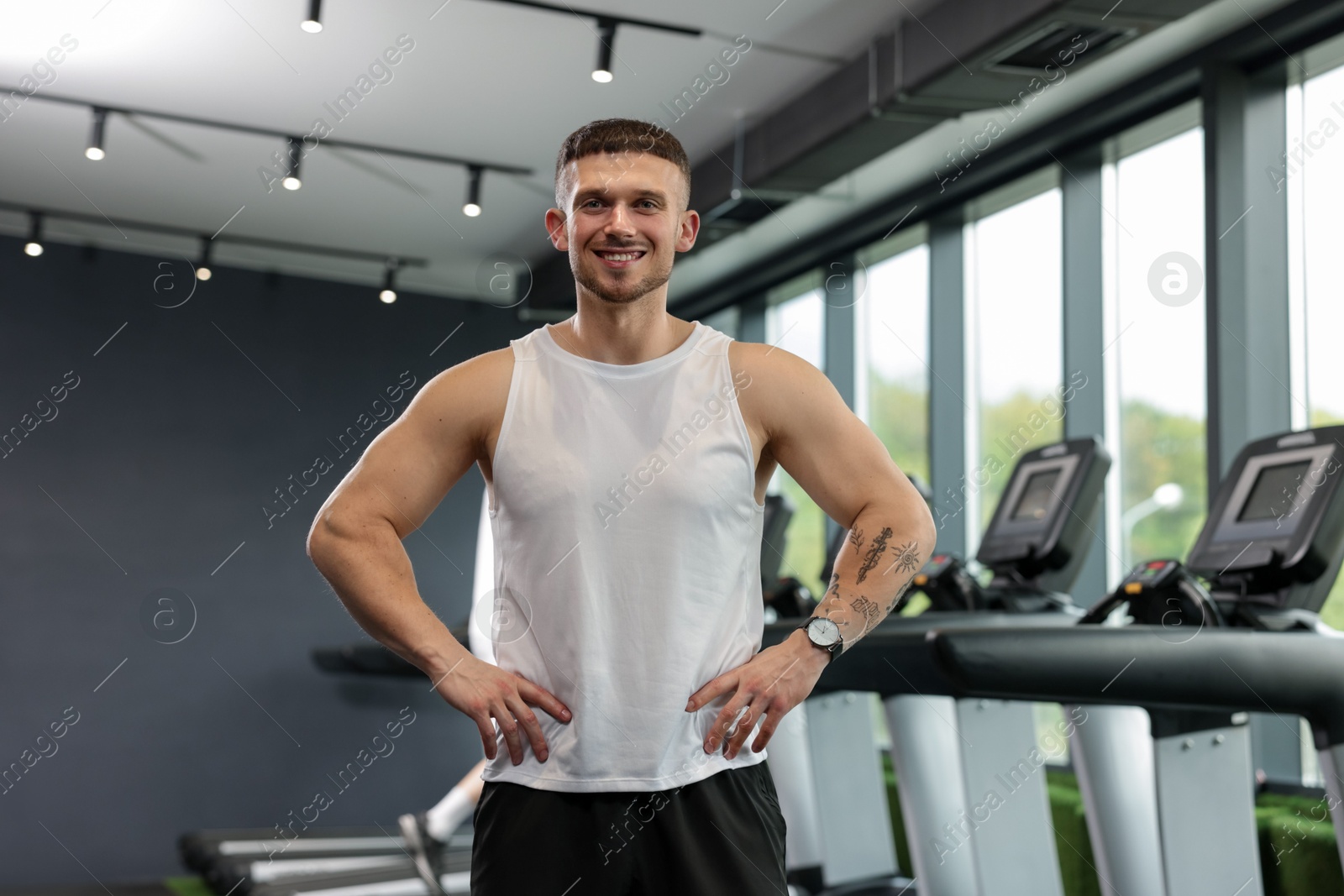 Portrait of professional personal trainer in sport center Photo of Portrait of professional personal trainer in sport center