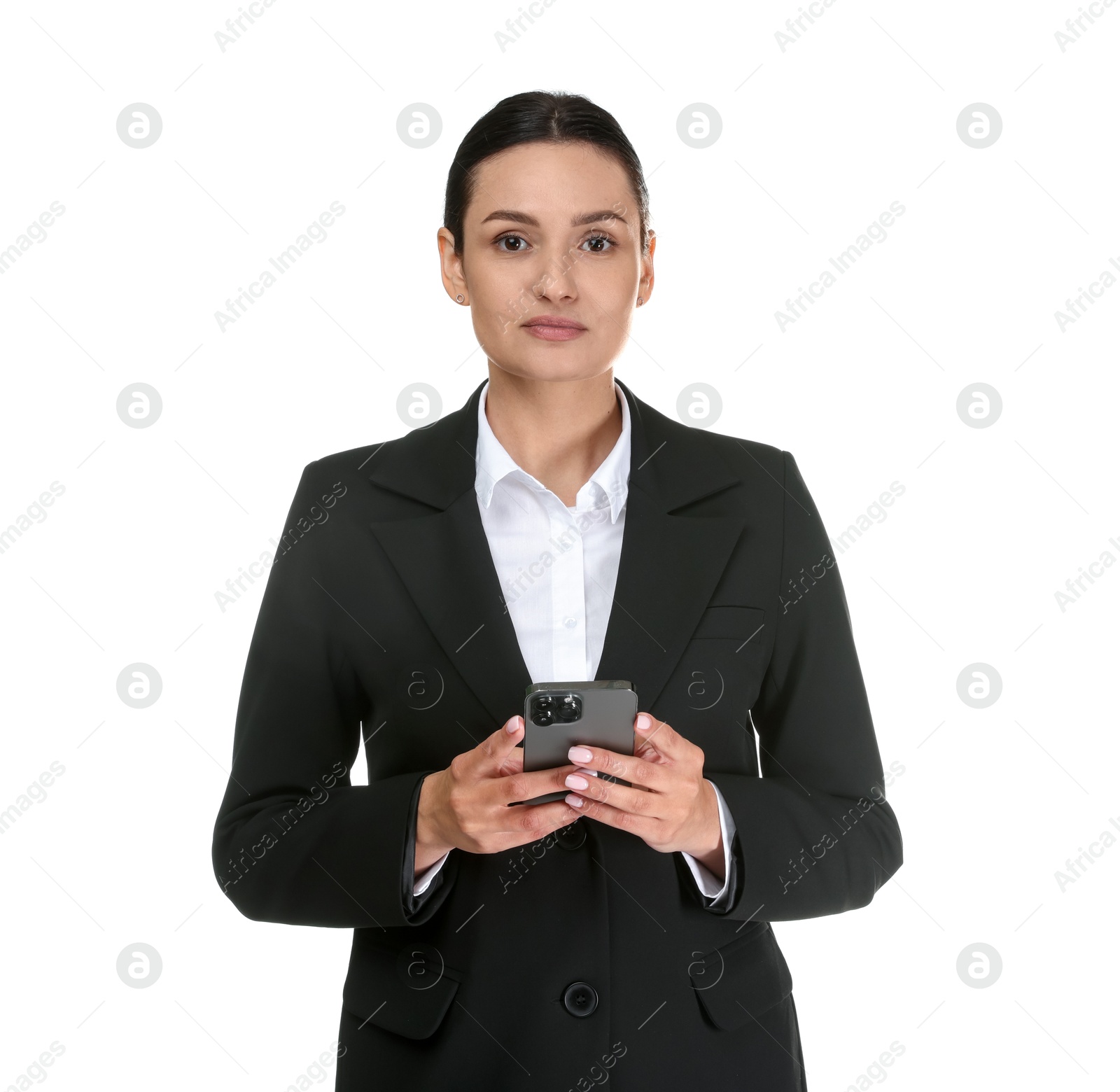 Confident business woman in suit with smartphone on white background Photo of Confident business woman in suit with smartphone on white background