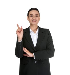 Photo of Confident business woman in suit pointing at something on white background