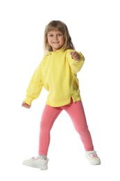 Photo of Happy little girl dancing on white background