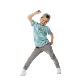 Photo of Happy little boy in baseball hat dancing on white background