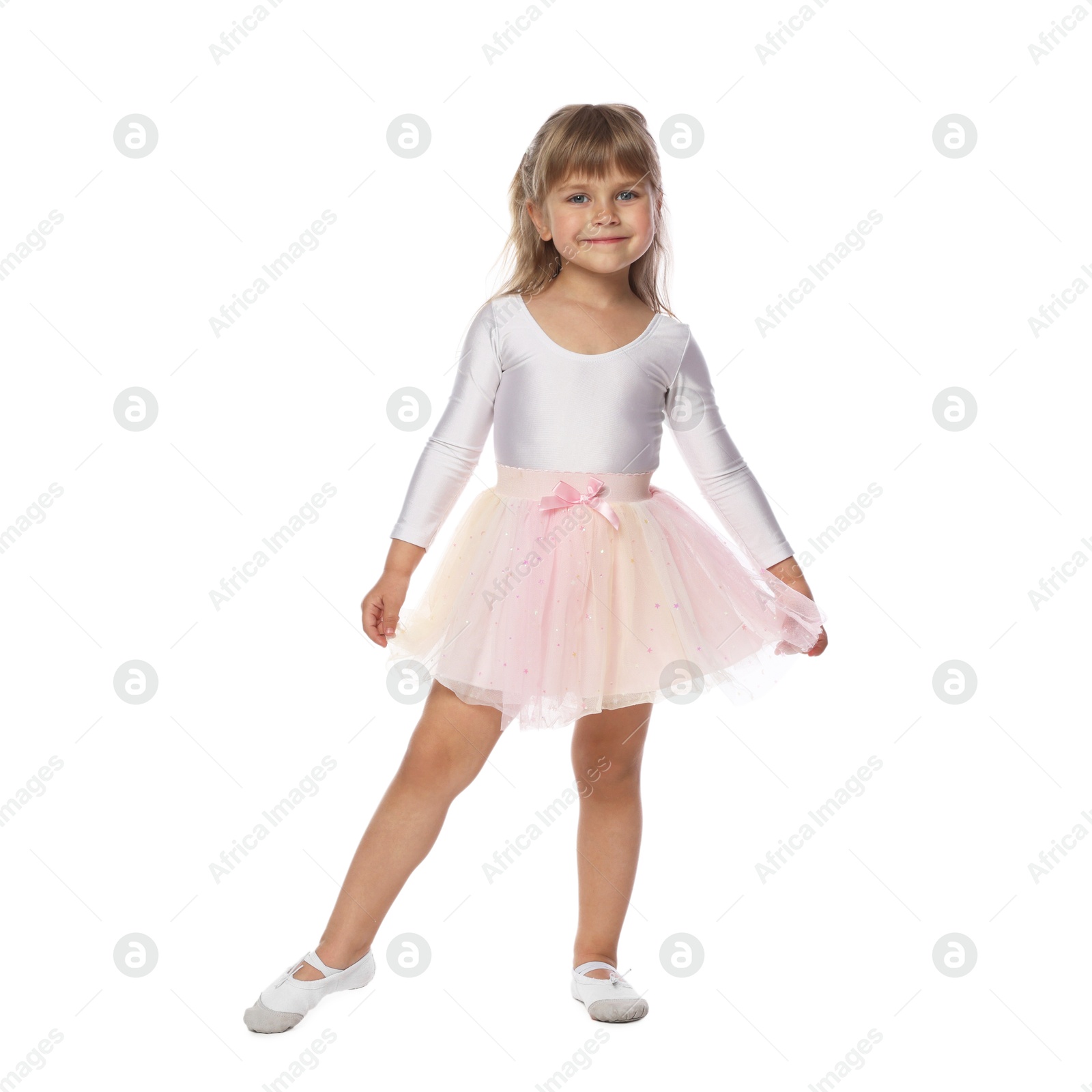 Cute little dancer in tutu skirt on white background Photo of Cute little dancer in tutu skirt on white background