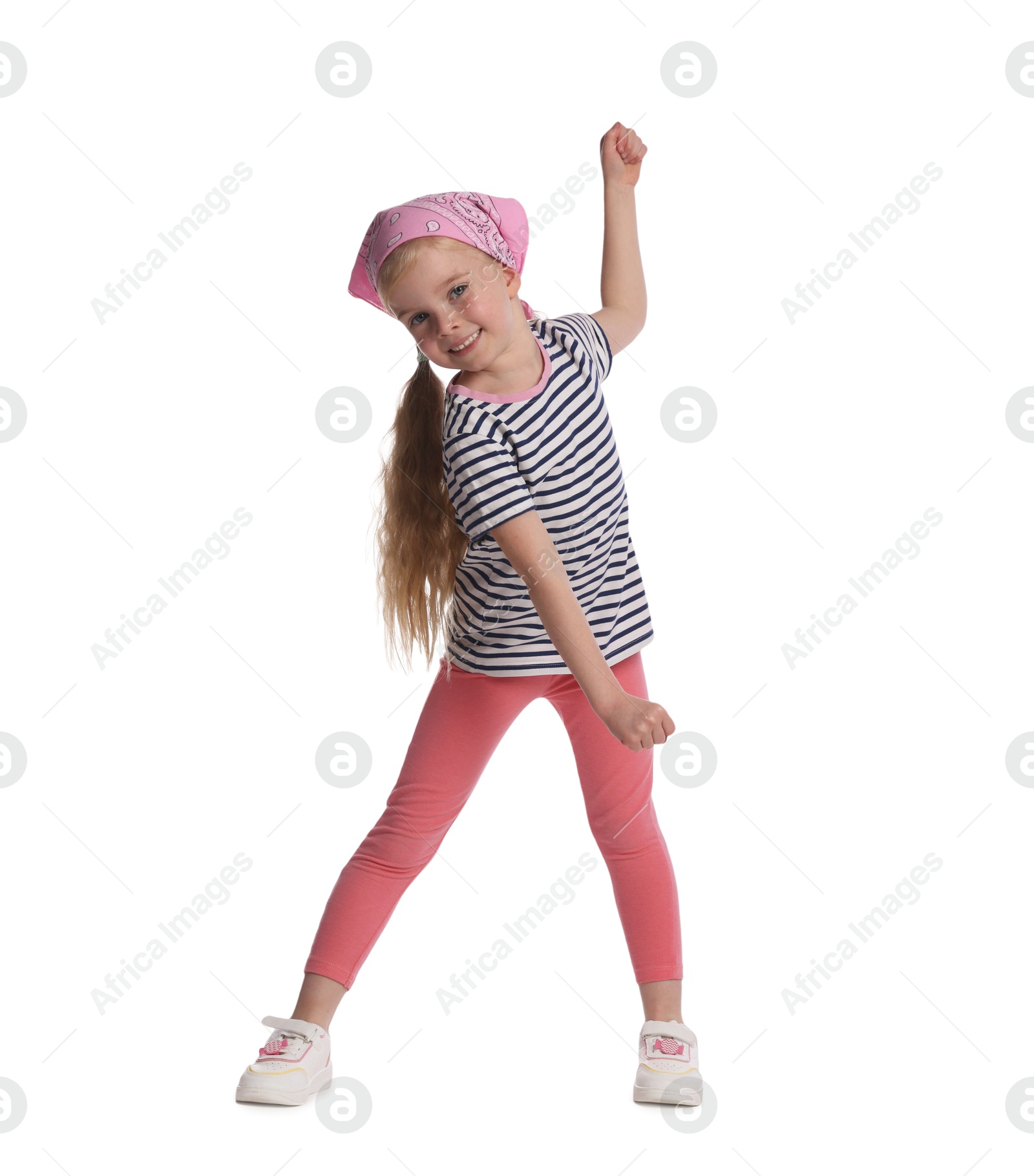 Cute little girl dancing on white background Photo of Cute little girl dancing on white background