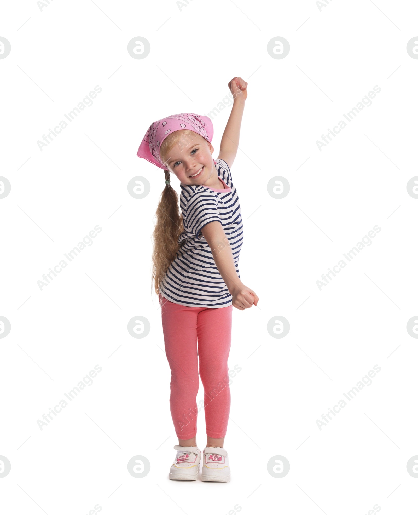 Cute little girl dancing on white background Photo of Cute little girl dancing on white background