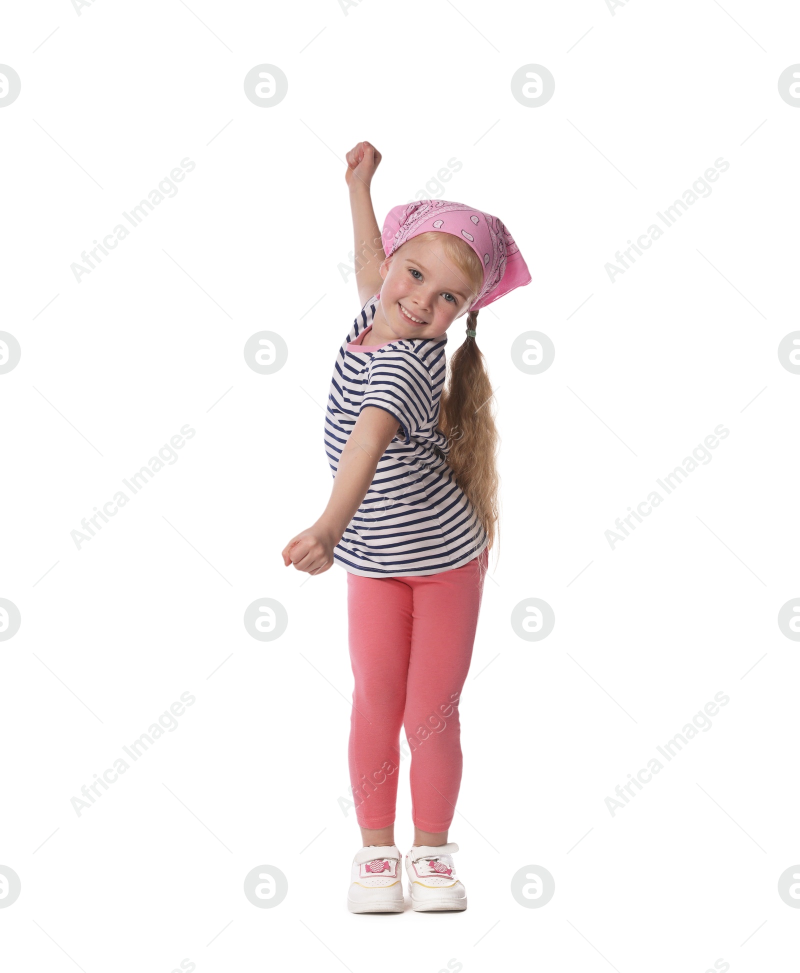 Cute little girl dancing on white background Photo of Cute little girl dancing on white background