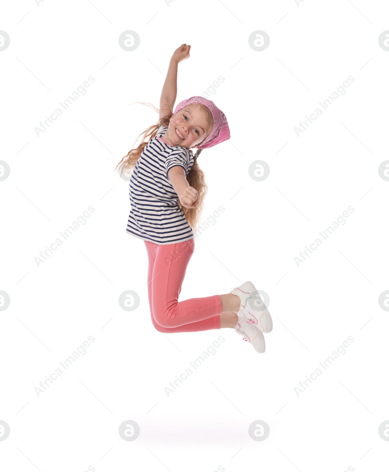 Cute little girl dancing on white background Photo of Cute little girl dancing on white background