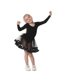Photo of Cute little girl dancing on white background
