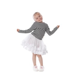 Photo of Cute little girl dancing on white background
