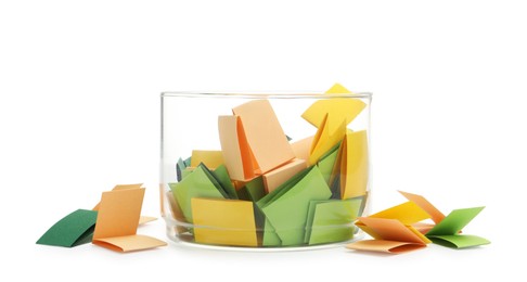 Photo of Colorful paper pieces in glass jar isolated on white
