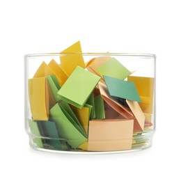 Photo of Colorful paper pieces in glass jar isolated on white