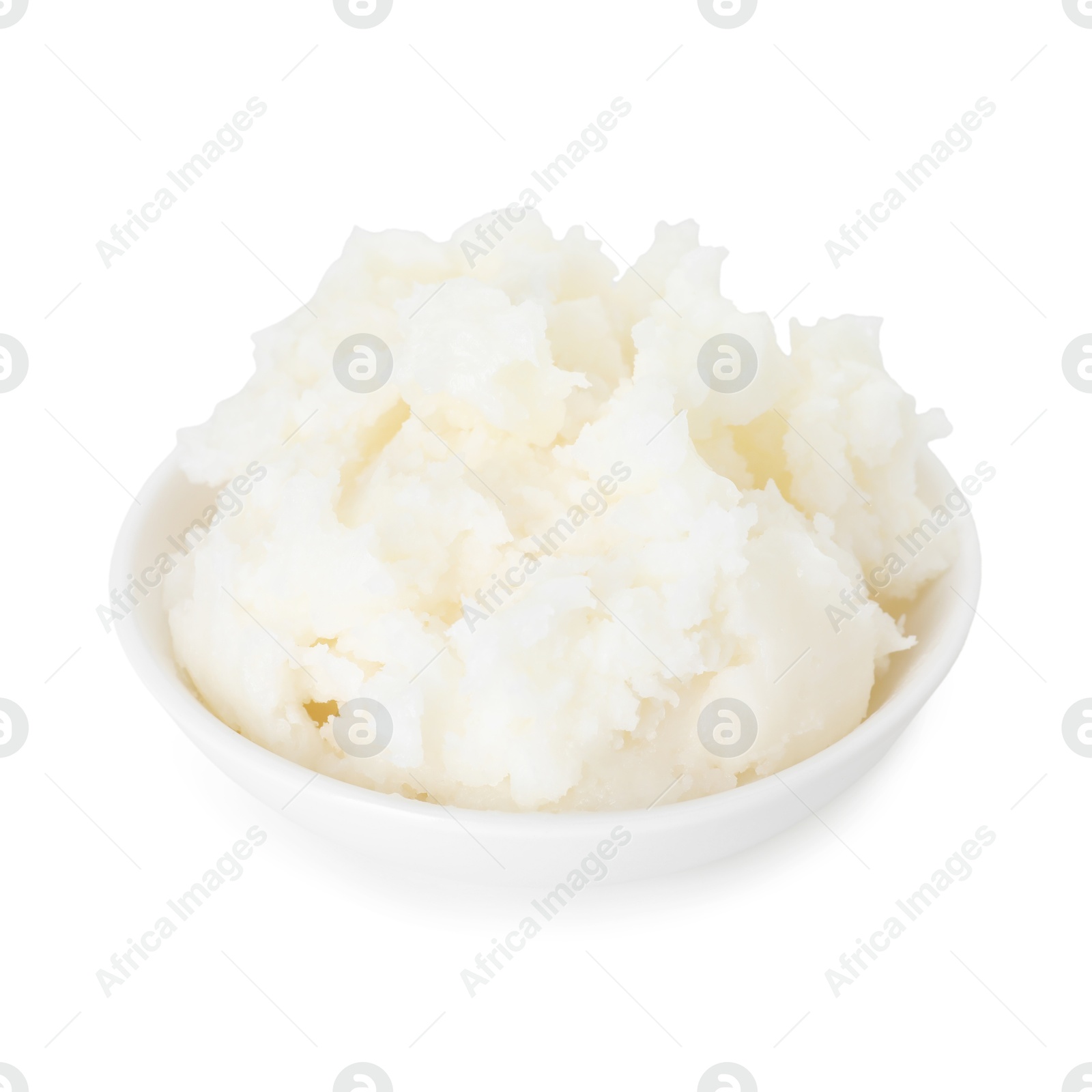 Shea butter in bowl isolated on white Photo of Shea butter in bowl isolated on white