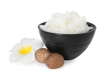 Photo of Natural shea butter in bowl, nuts and flower isolated on white