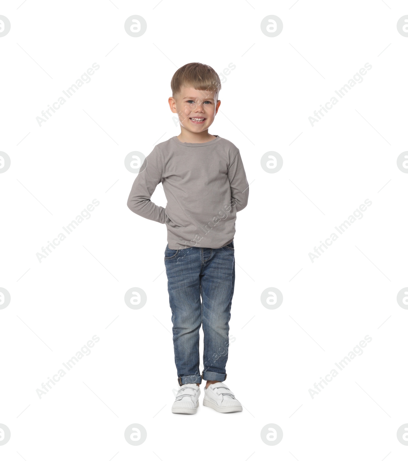 Happy little boy dancing on white background Photo of Happy little boy dancing on white background
